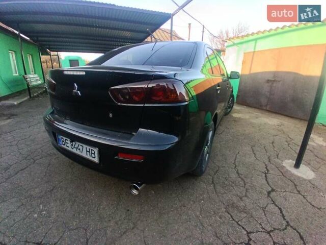 Чорний Міцубісі Lancer, об'ємом двигуна 2 л та пробігом 202 тис. км за 7800 $, фото 2 на Automoto.ua