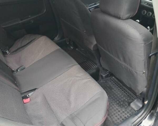 Чорний Міцубісі Lancer, об'ємом двигуна 2 л та пробігом 273 тис. км за 7100 $, фото 5 на Automoto.ua