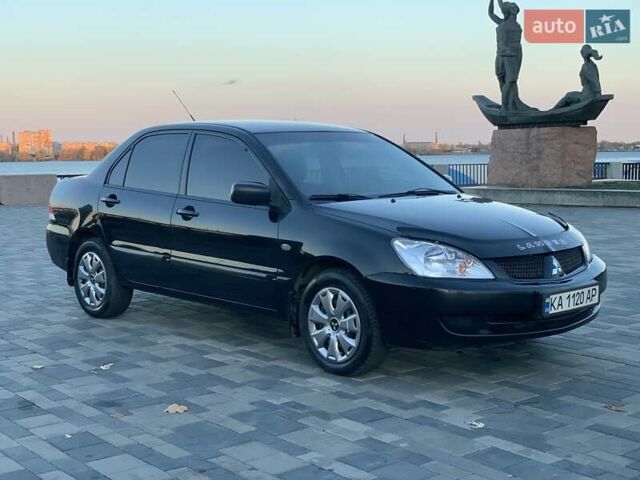 Чорний Міцубісі Lancer, об'ємом двигуна 1.58 л та пробігом 237 тис. км за 4300 $, фото 7 на Automoto.ua