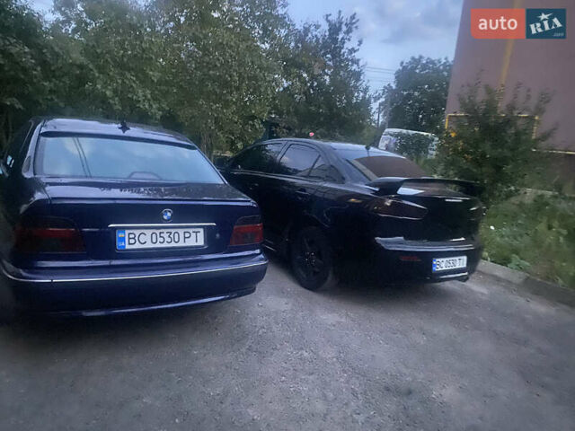 Черный Мицубиси Лансер, объемом двигателя 2 л и пробегом 333 тыс. км за 7300 $, фото 14 на Automoto.ua