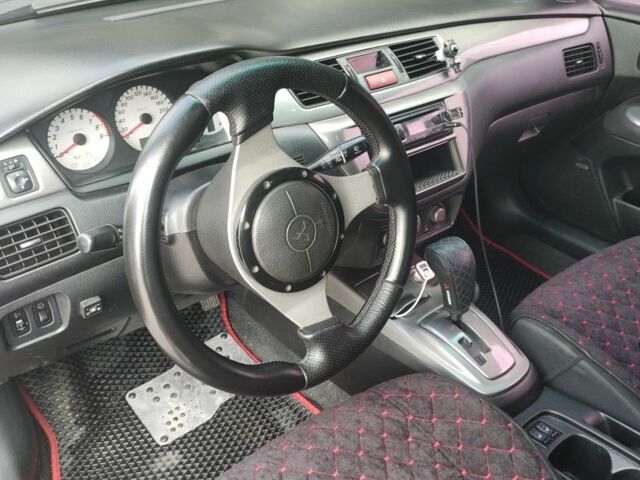 Міцубісі Lancer 2007 у Кам'янське (Дніпродзержинськ) на Automoto.ua Чорний Міцубісі Lancer, об'ємом двигуна 2 л та пробігом 268 тис. км за 5999 $, фото 6 на Automoto.ua