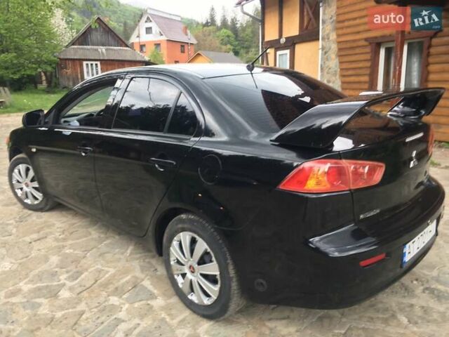 Черный Мицубиси Лансер, объемом двигателя 1.5 л и пробегом 240 тыс. км за 6900 $, фото 11 на Automoto.ua