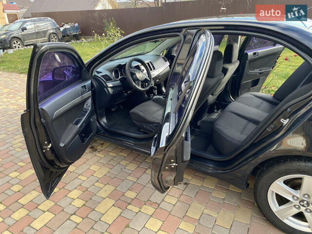 Чорний Міцубісі Lancer, об'ємом двигуна 1.5 л та пробігом 240 тис. км за 5650 $, фото 27 на Automoto.ua