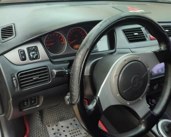 Мицубиси Лансер 2007 в Южноукраинске на Automoto.ua Черный Мицубиси Лансер, объемом двигателя 2 л и пробегом 161 тыс. км за 4600 $, фото 10 на Automoto.ua