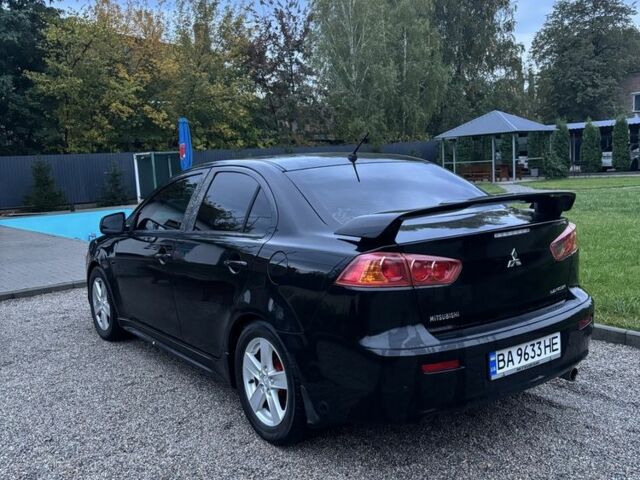 Чорний Міцубісі Lancer, об'ємом двигуна 2 л та пробігом 300 тис. км за 6185 $, фото 2 на Automoto.ua