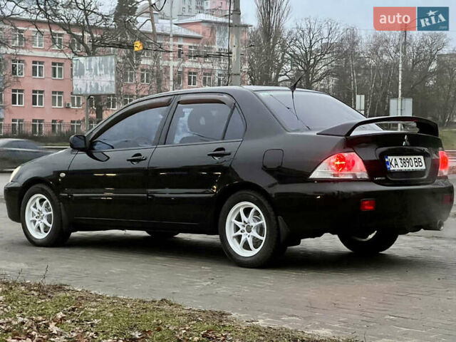 Чорний Міцубісі Lancer, об'ємом двигуна 1.6 л та пробігом 303 тис. км за 4350 $, фото 20 на Automoto.ua