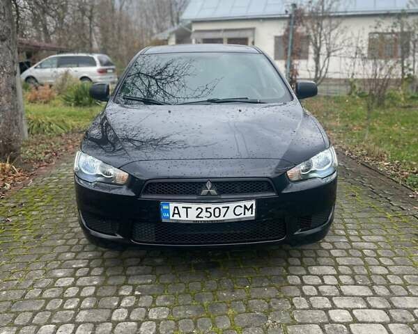 Черный Мицубиси Лансер, объемом двигателя 1.5 л и пробегом 270 тыс. км за 4999 $, фото 12 на Automoto.ua