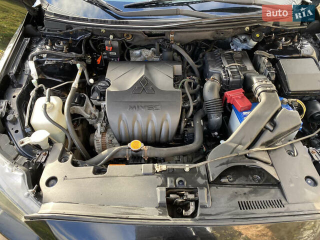 Чорний Міцубісі Lancer, об'ємом двигуна 1.5 л та пробігом 240 тис. км за 5650 $, фото 23 на Automoto.ua