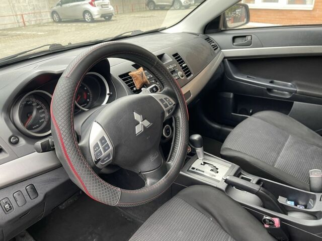 Чорний Міцубісі Lancer, об'ємом двигуна 2 л та пробігом 200 тис. км за 6800 $, фото 7 на Automoto.ua
