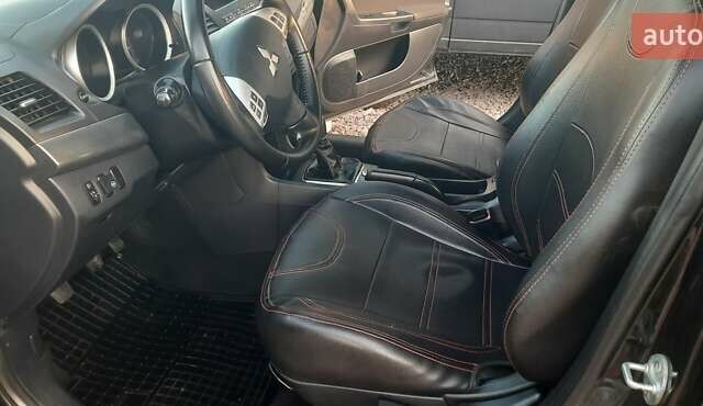 Міцубісі Lancer 2007 у Києві на Automoto.ua Чорний Міцубісі Lancer, об'ємом двигуна 2 л та пробігом 238 тис. км за 5350 $, фото 11 на Automoto.ua