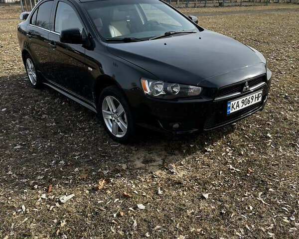 Чорний Міцубісі Lancer, об'ємом двигуна 2 л та пробігом 255 тис. км за 5000 $, фото 6 на Automoto.ua