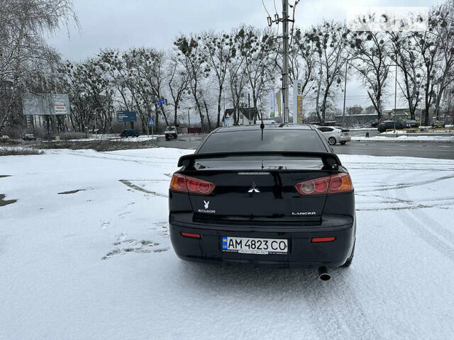 Чорний Міцубісі Lancer, об'ємом двигуна 2 л та пробігом 199 тис. км за 7000 $, фото 6 на Automoto.ua