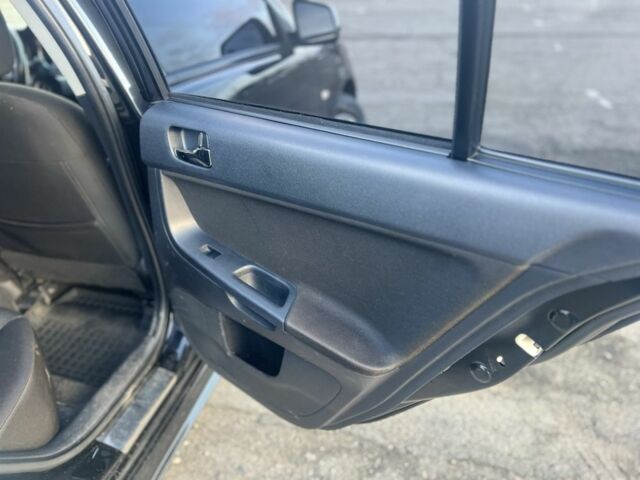 Черный Мицубиси Лансер, объемом двигателя 2 л и пробегом 170 тыс. км за 7900 $, фото 15 на Automoto.ua