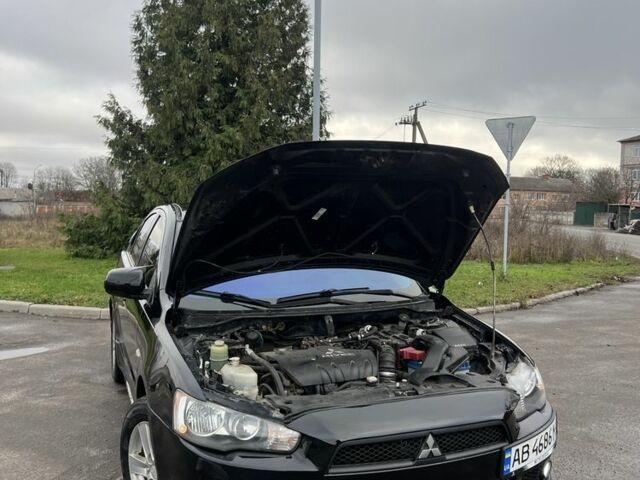 Черный Мицубиси Лансер, объемом двигателя 2 л и пробегом 350 тыс. км за 6700 $, фото 11 на Automoto.ua