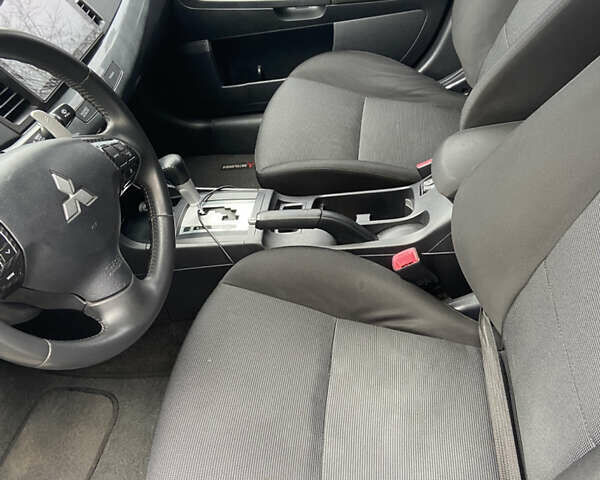 Чорний Міцубісі Lancer, об'ємом двигуна 2 л та пробігом 222 тис. км за 7500 $, фото 17 на Automoto.ua