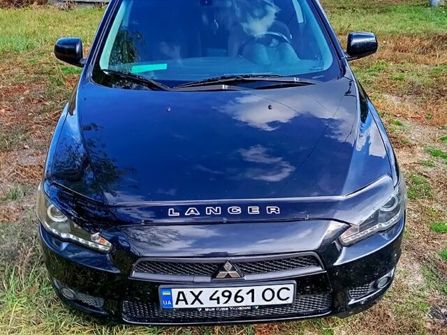 Мицубиси Лансер 2007 в Лозовой на Automoto.ua Черный Мицубиси Лансер, объемом двигателя 2 л и пробегом 190 тыс. км за 6500 $, фото 4 на Automoto.ua