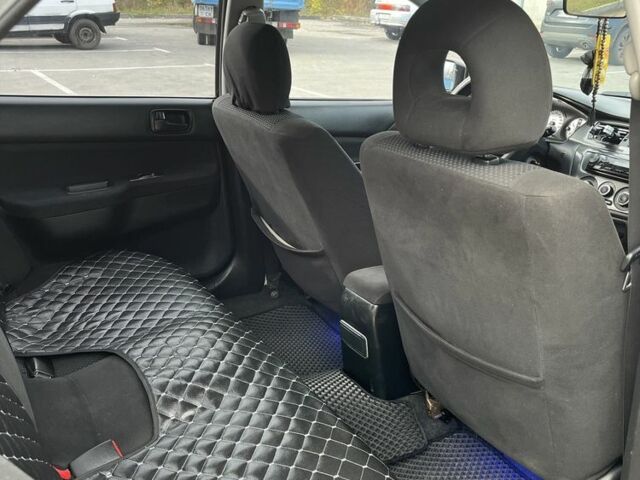 Чорний Міцубісі Lancer, об'ємом двигуна 1.6 л та пробігом 250 тис. км за 4800 $, фото 5 на Automoto.ua