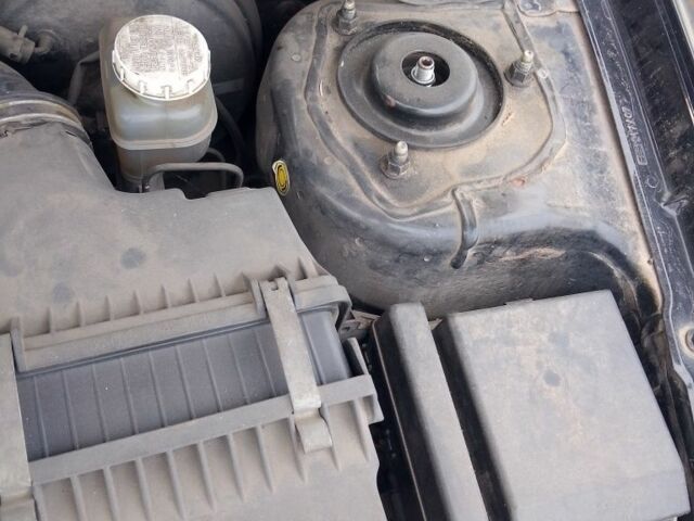 Чорний Міцубісі Lancer, об'ємом двигуна 1.6 л та пробігом 255 тис. км за 5000 $, фото 6 на Automoto.ua