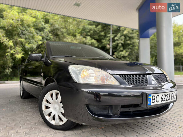 Чорний Міцубісі Lancer, об'ємом двигуна 1.6 л та пробігом 173 тис. км за 3700 $, фото 3 на Automoto.ua