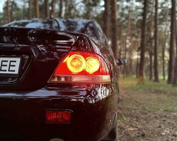 Чорний Міцубісі Lancer, об'ємом двигуна 1.58 л та пробігом 224 тис. км за 3900 $, фото 1 на Automoto.ua