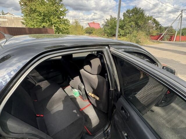 Чорний Міцубісі Lancer, об'ємом двигуна 1.6 л та пробігом 244 тис. км за 4999 $, фото 6 на Automoto.ua