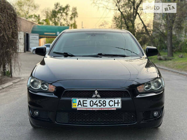 Чорний Міцубісі Lancer, об'ємом двигуна 2 л та пробігом 220 тис. км за 7700 $, фото 1 на Automoto.ua