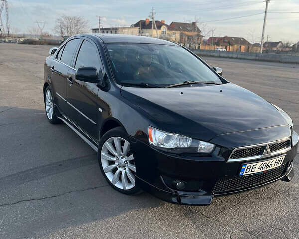 Черный Мицубиси Лансер, объемом двигателя 2 л и пробегом 193 тыс. км за 7500 $, фото 5 на Automoto.ua