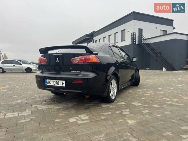 Черный Мицубиси Лансер, объемом двигателя 2 л и пробегом 259 тыс. км за 6500 $, фото 1 на Automoto.ua