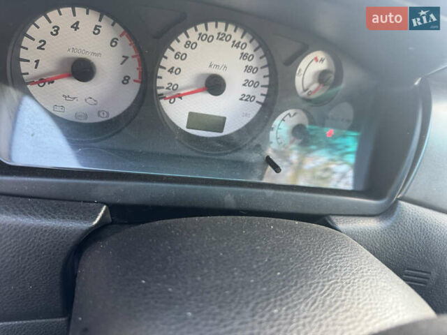 Чорний Міцубісі Lancer, об'ємом двигуна 1.58 л та пробігом 243 тис. км за 3800 $, фото 5 на Automoto.ua