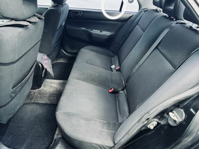 Чорний Міцубісі Lancer, об'ємом двигуна 1.6 л та пробігом 228 тис. км за 3300 $, фото 9 на Automoto.ua