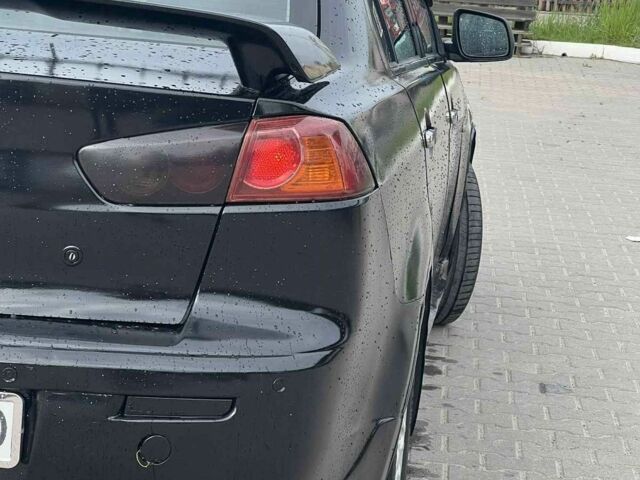 Черный Мицубиси Лансер, объемом двигателя 2 л и пробегом 350 тыс. км за 4299 $, фото 4 на Automoto.ua