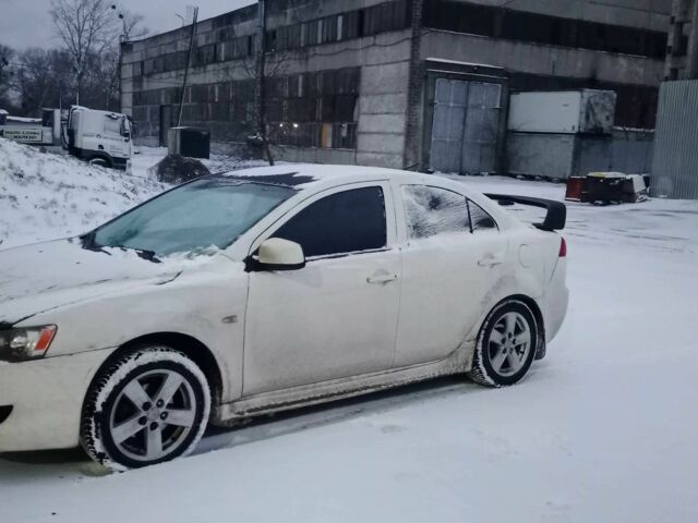 Черный Мицубиси Лансер, объемом двигателя 2 л и пробегом 350 тыс. км за 5500 $, фото 4 на Automoto.ua