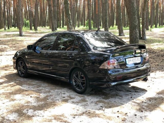Чорний Міцубісі Lancer, об'ємом двигуна 2 л та пробігом 170 тис. км за 5650 $, фото 5 на Automoto.ua