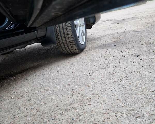 Чорний Міцубісі Lancer, об'ємом двигуна 1.6 л та пробігом 273 тис. км за 3999 $, фото 19 на Automoto.ua