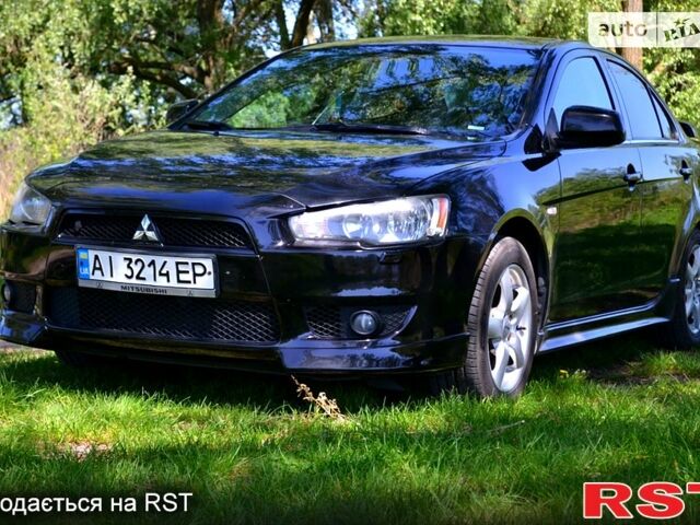 Чорний Міцубісі Lancer, об'ємом двигуна 1.8 л та пробігом 226 тис. км за 6600 $, фото 3 на Automoto.ua