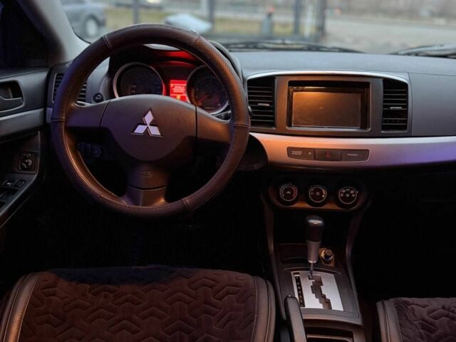 Чорний Міцубісі Lancer, об'ємом двигуна 0 л та пробігом 245 тис. км за 4499 $, фото 7 на Automoto.ua