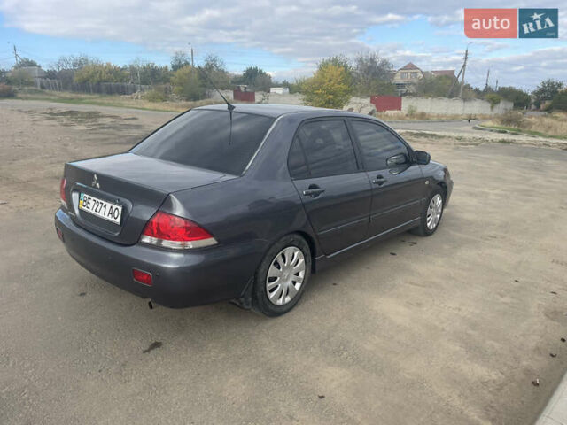 Чорний Міцубісі Lancer, об'ємом двигуна 1.6 л та пробігом 162 тис. км за 4650 $, фото 5 на Automoto.ua