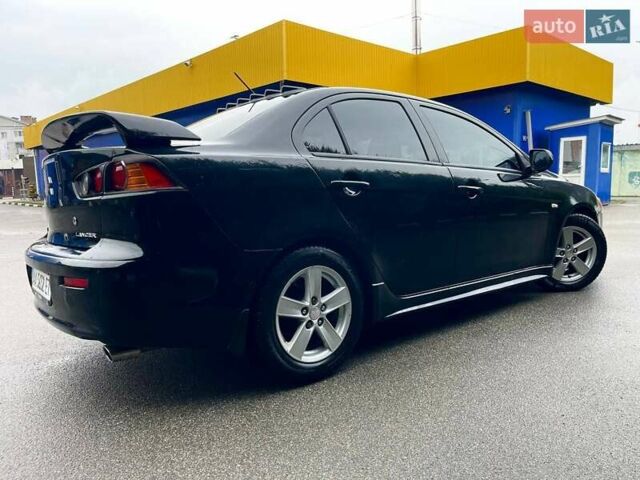 Чорний Міцубісі Lancer, об'ємом двигуна 2 л та пробігом 69 тис. км за 5700 $, фото 4 на Automoto.ua