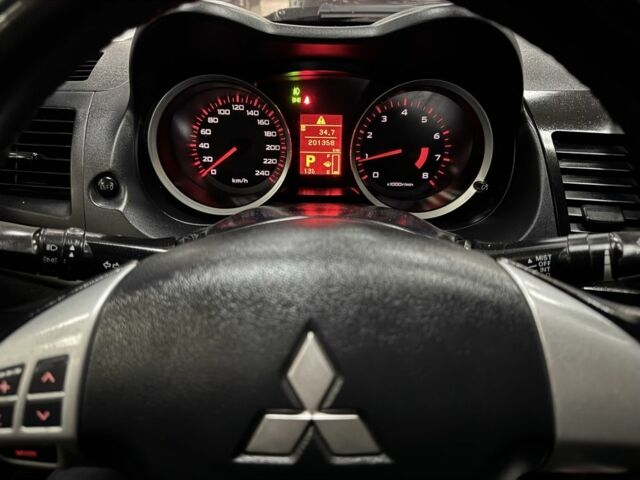 Чорний Міцубісі Lancer, об'ємом двигуна 1.5 л та пробігом 201 тис. км за 6900 $, фото 16 на Automoto.ua