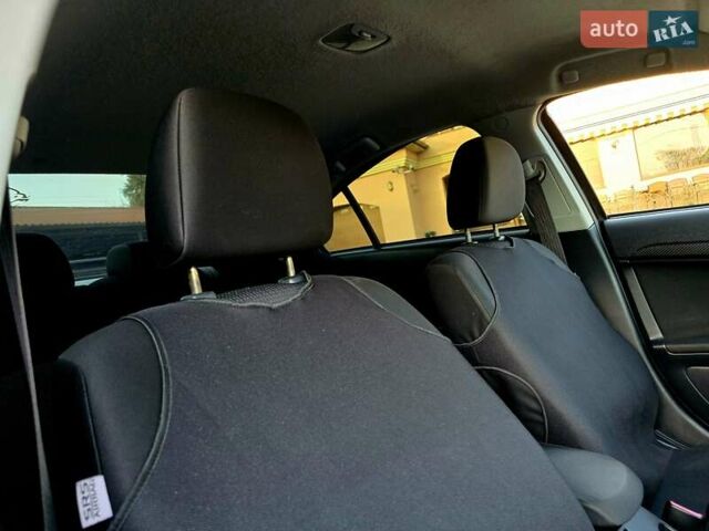 Чорний Міцубісі Lancer, об'ємом двигуна 2 л та пробігом 260 тис. км за 6555 $, фото 35 на Automoto.ua