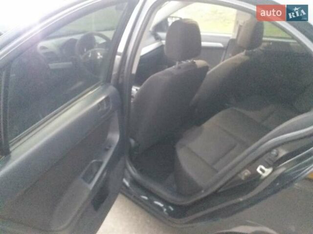 Черный Мицубиси Лансер, объемом двигателя 1.5 л и пробегом 270 тыс. км за 4500 $, фото 15 на Automoto.ua