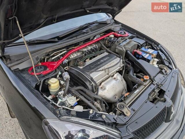 Чорний Міцубісі Lancer, об'ємом двигуна 2 л та пробігом 152 тис. км за 5500 $, фото 20 на Automoto.ua