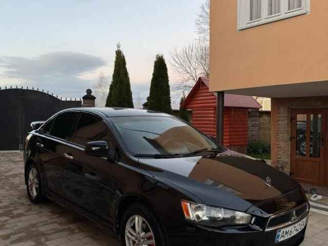 Черный Мицубиси Лансер, объемом двигателя 2 л и пробегом 247 тыс. км за 4700 $, фото 1 на Automoto.ua