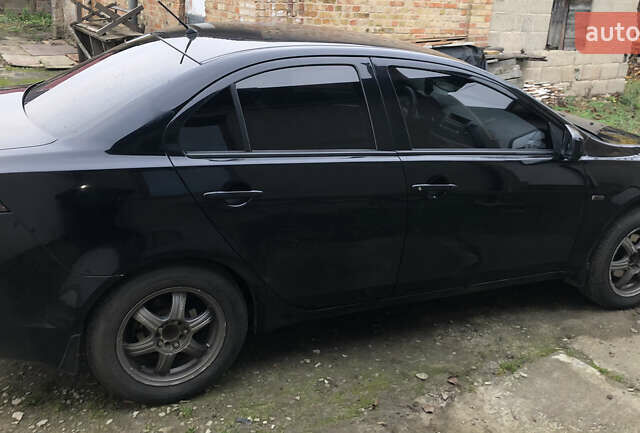 Чорний Міцубісі Lancer, об'ємом двигуна 1.5 л та пробігом 244 тис. км за 5000 $, фото 5 на Automoto.ua