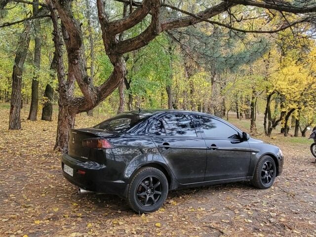 Чорний Міцубісі Lancer, об'ємом двигуна 2 л та пробігом 270 тис. км за 5500 $, фото 2 на Automoto.ua