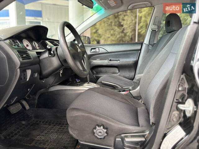 Чорний Міцубісі Lancer, об'ємом двигуна 1.6 л та пробігом 173 тис. км за 3700 $, фото 15 на Automoto.ua