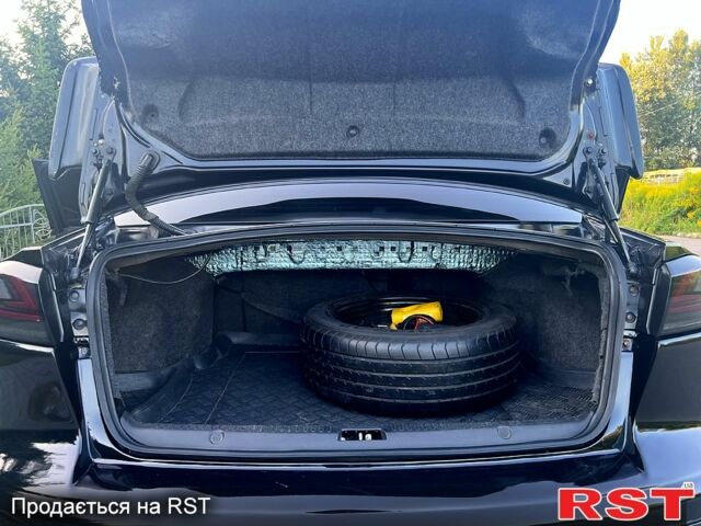 Черный Мицубиси Лансер, объемом двигателя 2 л и пробегом 216 тыс. км за 7500 $, фото 6 на Automoto.ua