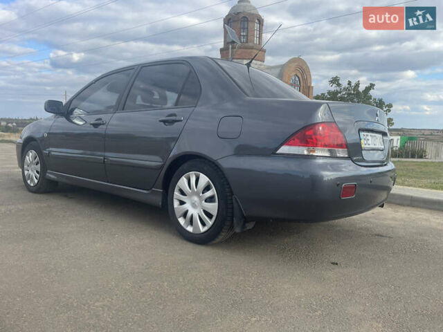 Чорний Міцубісі Lancer, об'ємом двигуна 1.6 л та пробігом 162 тис. км за 4650 $, фото 7 на Automoto.ua