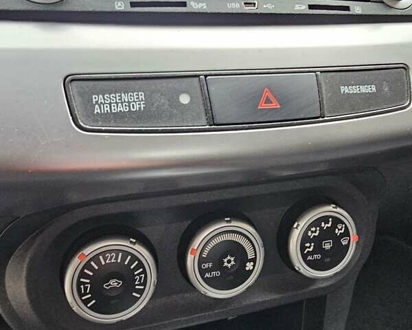 Міцубісі Lancer 2007 у Києві на Automoto.ua Чорний Міцубісі Lancer, об'ємом двигуна 2 л та пробігом 115 тис. км за 5000 $, фото 20 на Automoto.ua