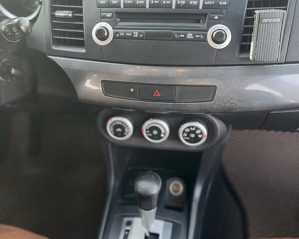 Черный Мицубиси Лансер, объемом двигателя 2 л и пробегом 193 тыс. км за 7500 $, фото 10 на Automoto.ua